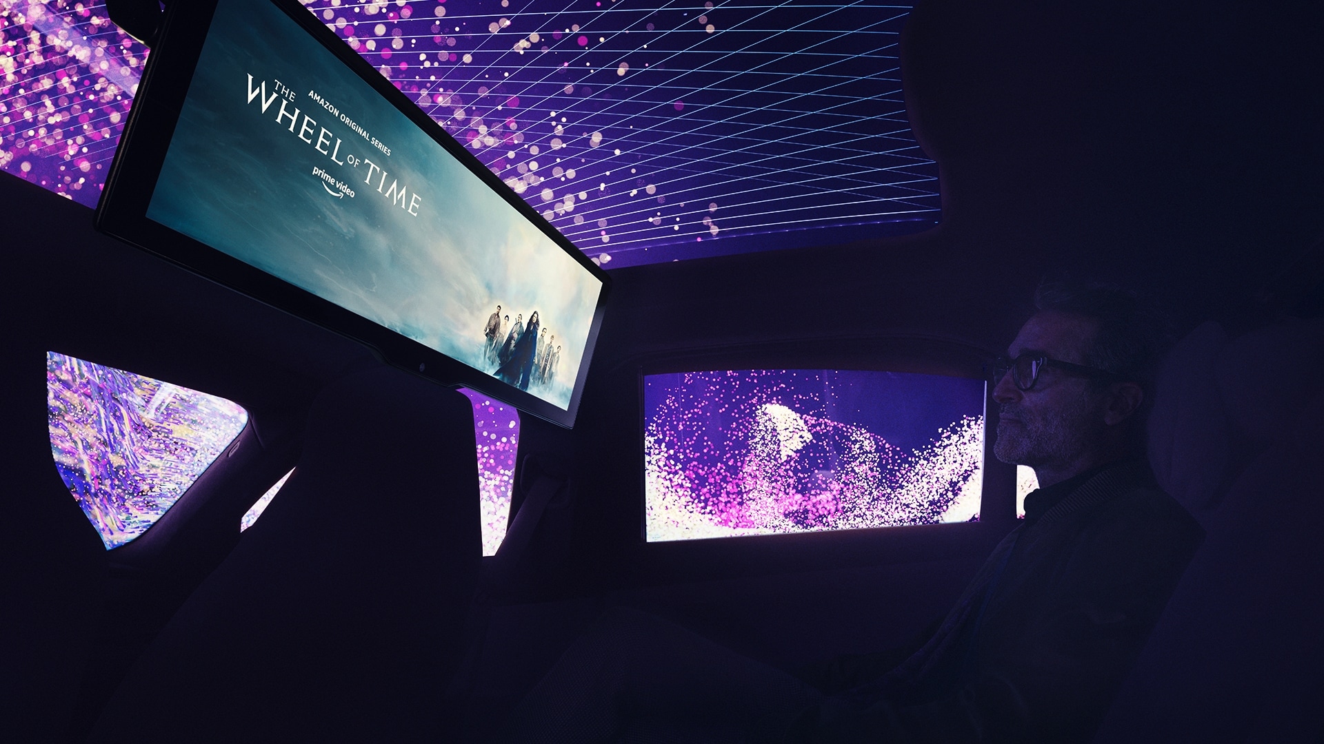 The rear seat becomes a private cinema on wheels